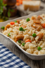 Delicious risotto with chicken and green peas.