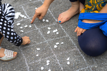 Vietnamese traditional game called O An Quan closeup
