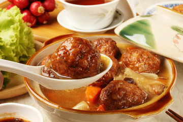 Braised pork balls in soy sauce   - Chinese  pork meatballs stewed with  cabbage.