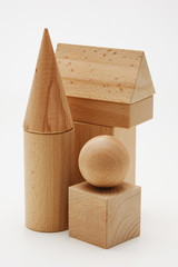 wooden geometric shapes  on a white