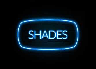 Shades  - colorful Neon Sign on brickwall