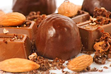 Image of chocolate, and almond nuts close up