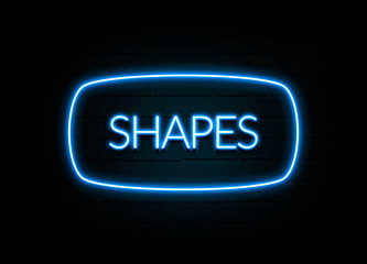 Shapes  - colorful Neon Sign on brickwall