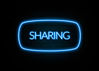 Sharing  - colorful Neon Sign on brickwall