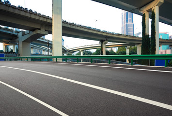 Empty road surface floor with City road overpass viaduct bridge