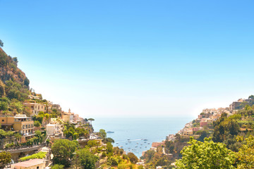 Positano view with typical Campania province houses and sea on horizon.