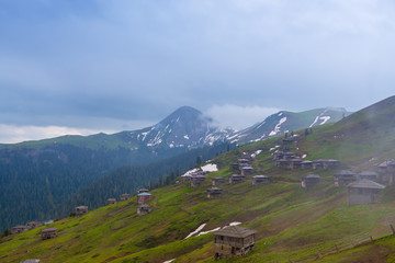 Old abandoned mountain village, in the mist