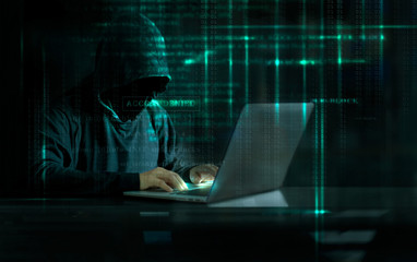 Cyber Attack Hacker using computer with code on interface digital dark background. Security System and Internet crime concept.