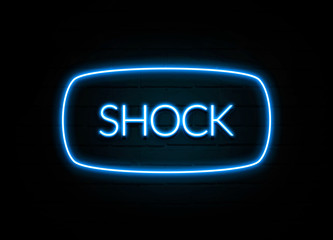 Shock  - colorful Neon Sign on brickwall