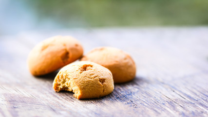 Homemade sugar cookies on wooden table