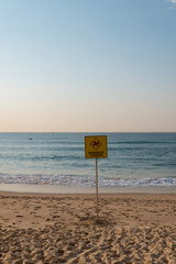 Dangerous current sign on the beach.