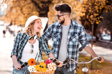 Happy couple enjoying a walk in the park.