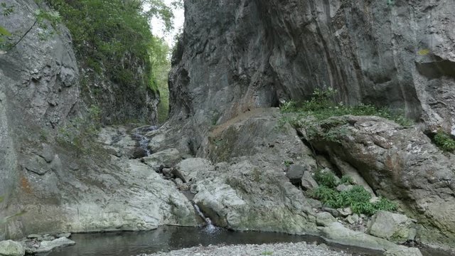 Natural water spring cascades close-up footage - Stone bridge in Eastern Serbia