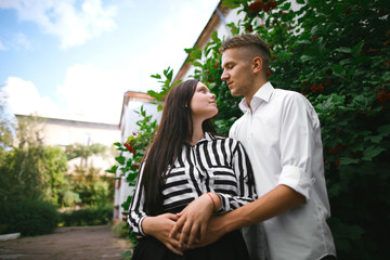 Fototapeta premium Loving Young Couple. The Guy and the Girl Love Each Other