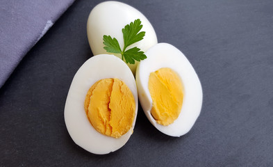 Boiled eggs on dark background close up