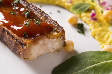 grilled bacon with guava jam, pea salad, watercress and onion.