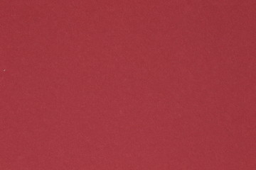 Color paper texture. Dark red.