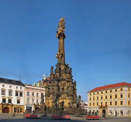 Fototapeta na wymiar OLOMOUC, CZECH REPUBLIC-AUGUST 27, 2017: View of the Upper Square in the czech city Olomouc dominated by the Holy Trinity Column enlisted in the Unseco world heritage list