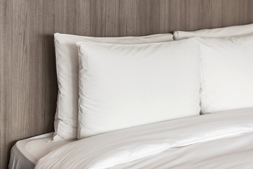 white pillow with bed closeup 