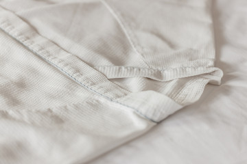 white hotel pajamas closeup at the daylight. 