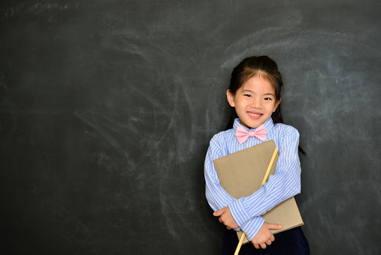 cheerful little kid teacher finished teaching
