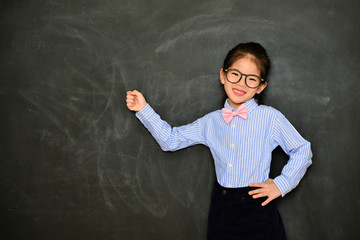 young female little teacher using hand teaching