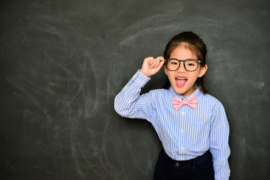 cheerful little girl dress up school teacher