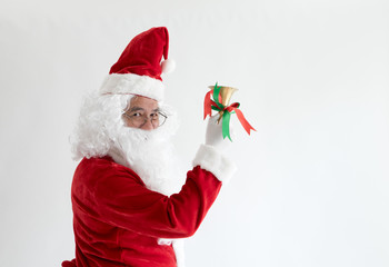 Santa claus with bell in hand.