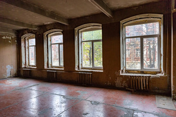 Ruined abandoned room in a house requiring major repairs
