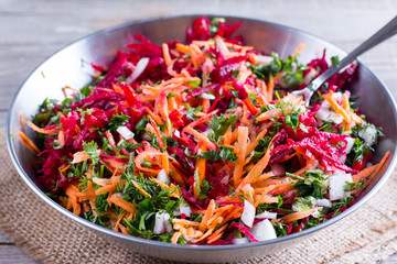 Preparation of fresh salad. Sliced vegetables.