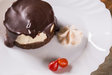 Cheesecake with Chocolate Sauce and pepper
