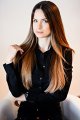 Portrait of sexy beautiful model girl with long gorgeous hair. Perfect skin and hair.