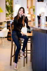 Portrait of sexy beautiful model girl with long gorgeous hair. Perfect skin and hair.