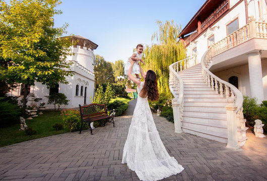 Mom And Child In Amazing Dresses Outdoor