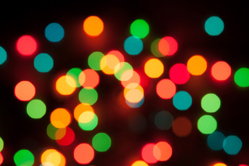 Christmas garland blurred. Abstract and colorful bokeh background.