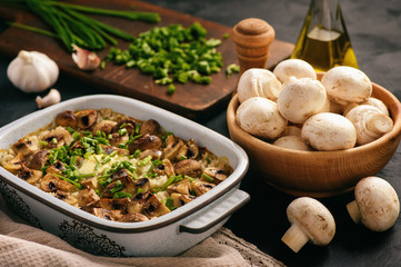 Vegetarian rice casserole with mushrooms, leek and garlic.