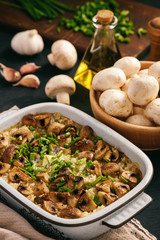 Vegetarian rice casserole with mushrooms, leek and garlic.