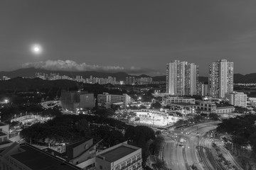 Obraz na płótnie Canvas Full moon over Hong Kong City