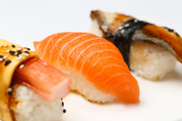 assorted sushi on white plate isolated on white back ground