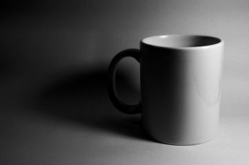 Mug on a white background. White dishes on a white background