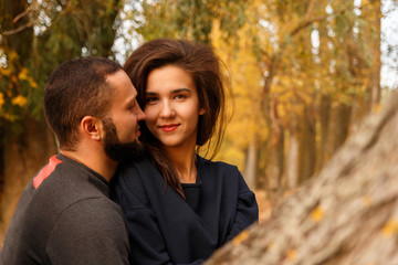 Romantic couple in love in autumn park