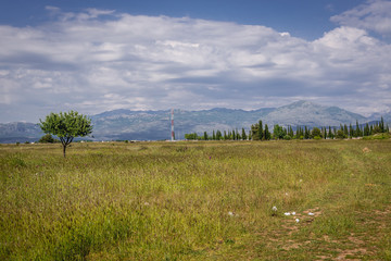 Fototapeta premium Plain near Podgorica International Airport in Montenegro