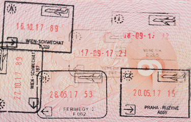 Inside page of a well traveled russian passport with stamps from different european customs: Hungary, italy, Austria, Czech Republic.