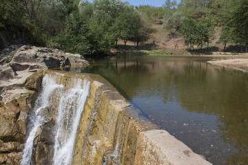 Fototapeta premium Perfect view waterfall in sunlight. Popular tourist attraction