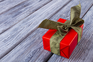 Red gift box on gray
