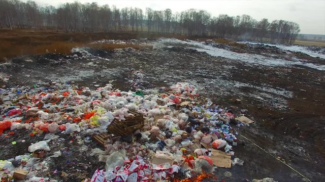 low span over a burning landfill