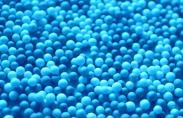 beautiful abstract background, texture of light and dark blue plastic balls