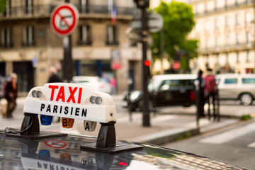 Taxi sign in Paris, France - obrazy, fototapety, plakaty