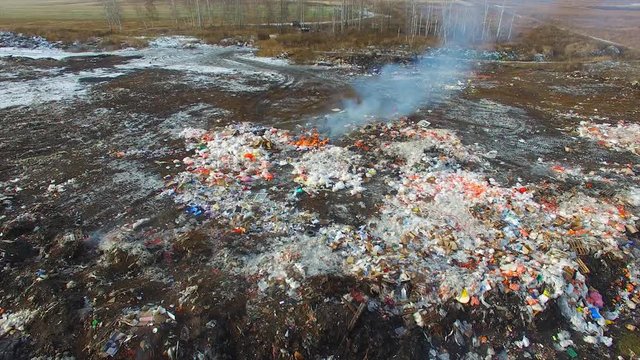 low span over a burning landfill