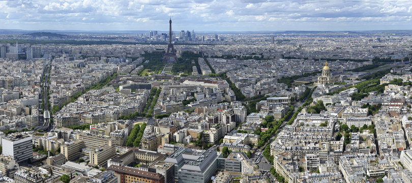 France, Paris, aerial and panoramic view of Paris, Eiffel Tower in front of the towers of La D&Atilde;&copy;fense. On the right-hand : Les Invalides and its golden dome